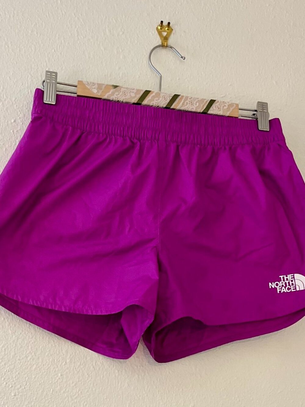 The North Face Women’s Athletic Shorts in a Vibrant Magenta Shade